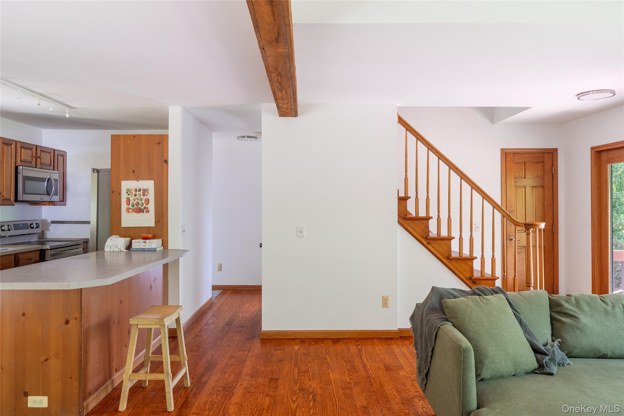 182 Frey Road Pine Bush, NY 12566 - Photo 11 of 33 a living room with furniture and a wooden floor