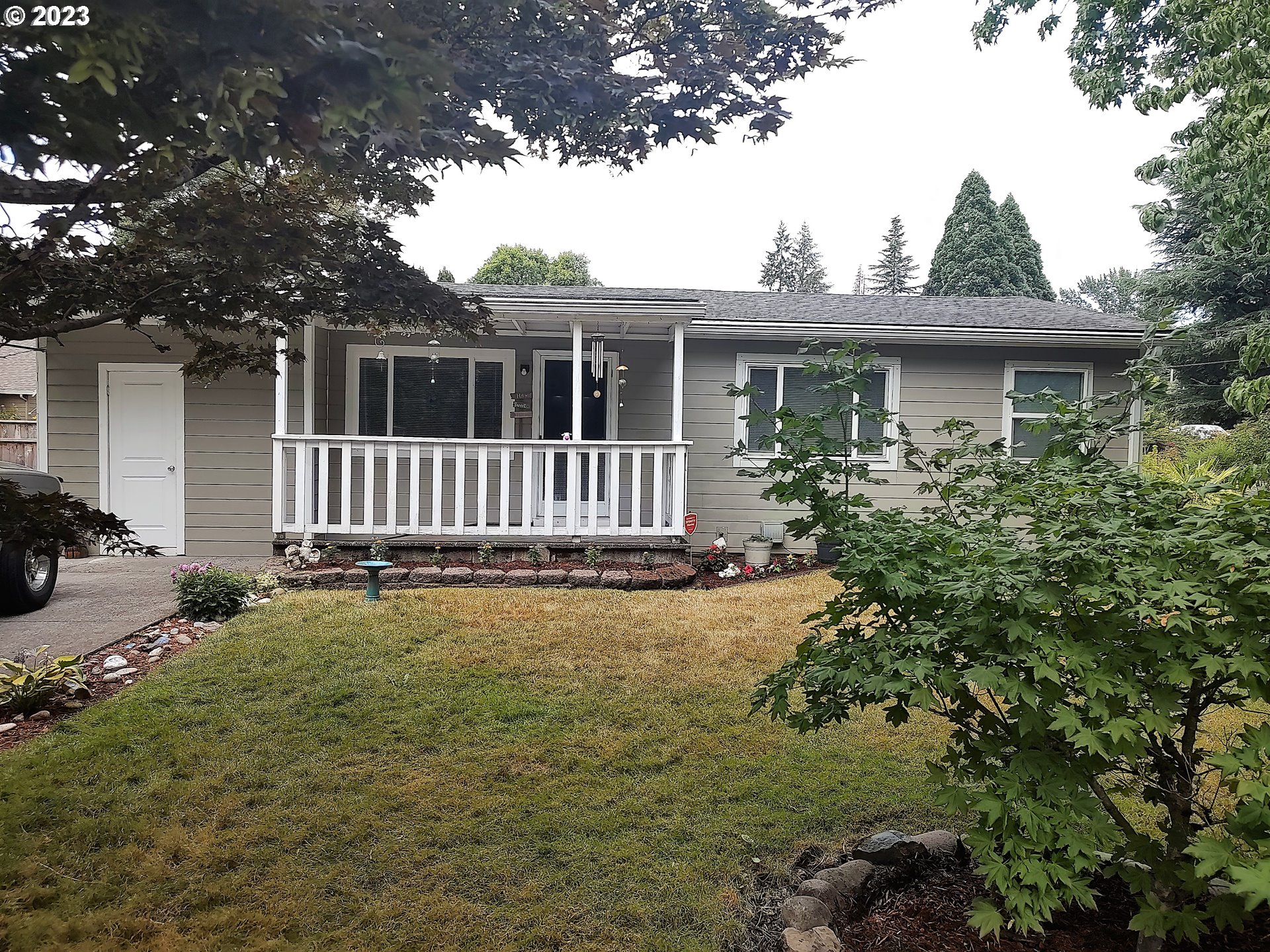 306 Southeast 4th Street Battle Ground, WA 98604 - Photo 1 of 23 front view of a house with a yard