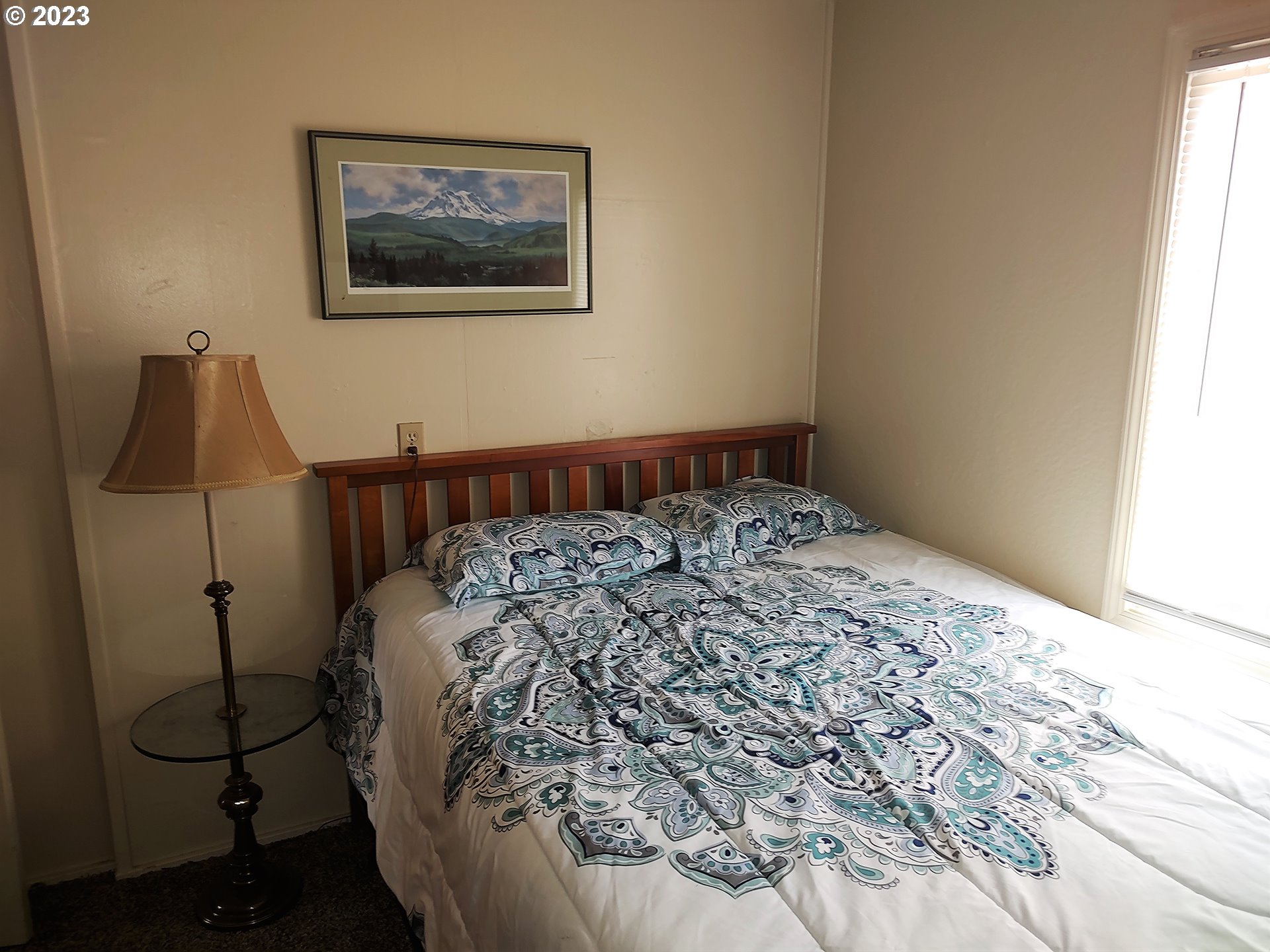 306 Southeast 4th Street Battle Ground, WA 98604 - Photo 14 of 23 a bedroom with a bed and a window