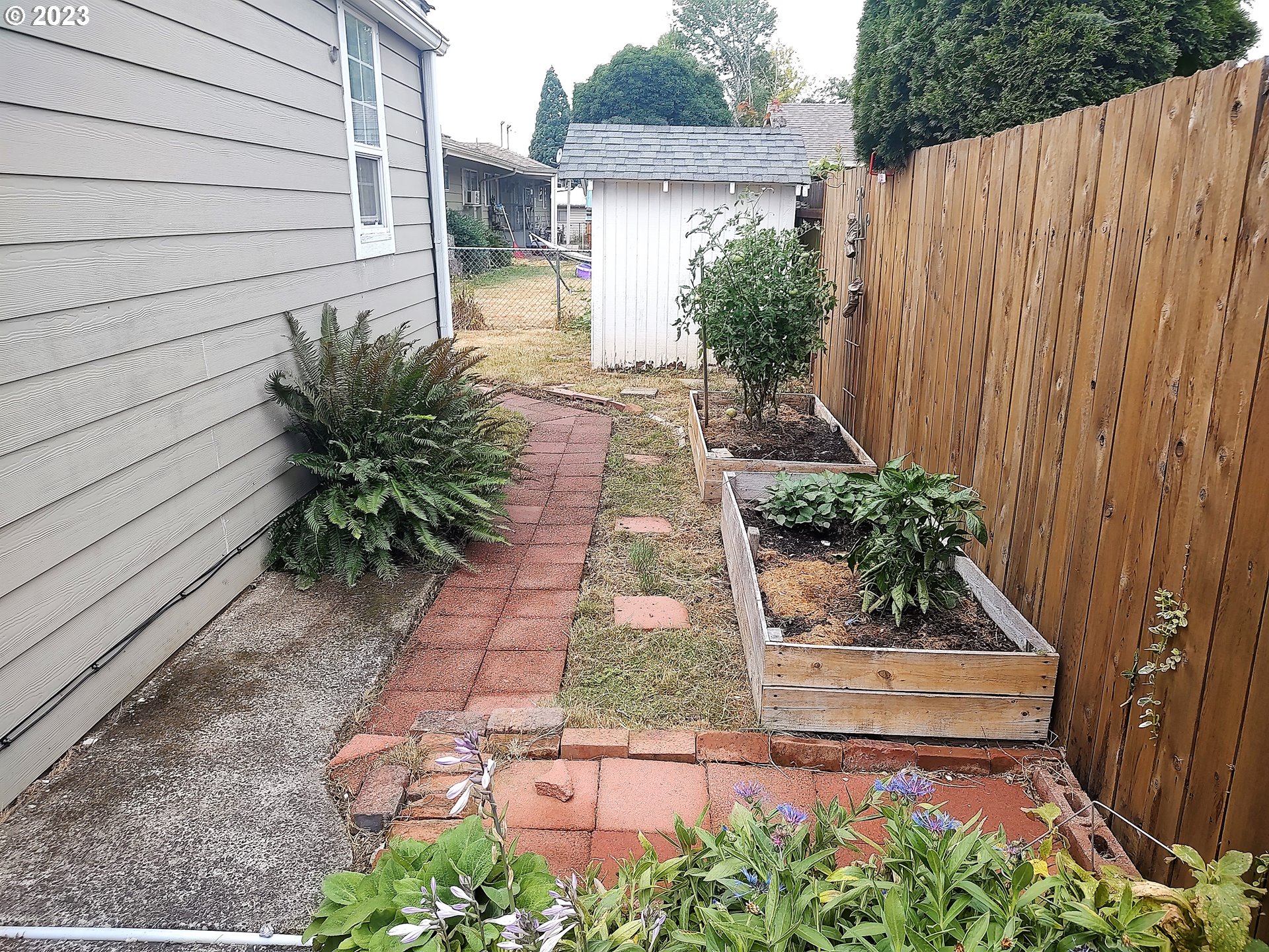 306 Southeast 4th Street Battle Ground, WA 98604 - Photo 23 of 23 a view of a backyard with plants