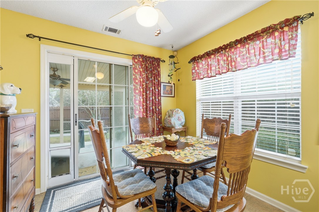 8 Sundance Court Pooler, GA 31322 - Photo 10 of 37 Eat-in kitchen to patio space outside