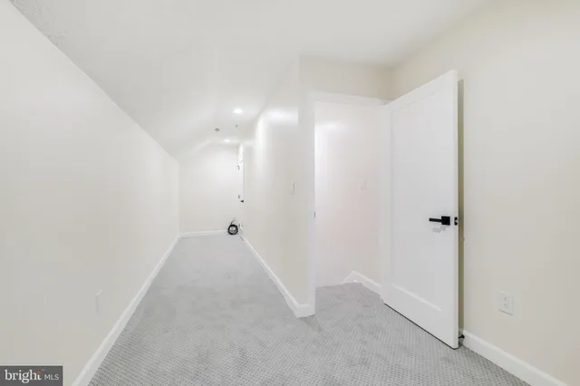 a view of a room with a hallway