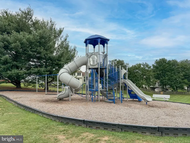 a view of a park with slide