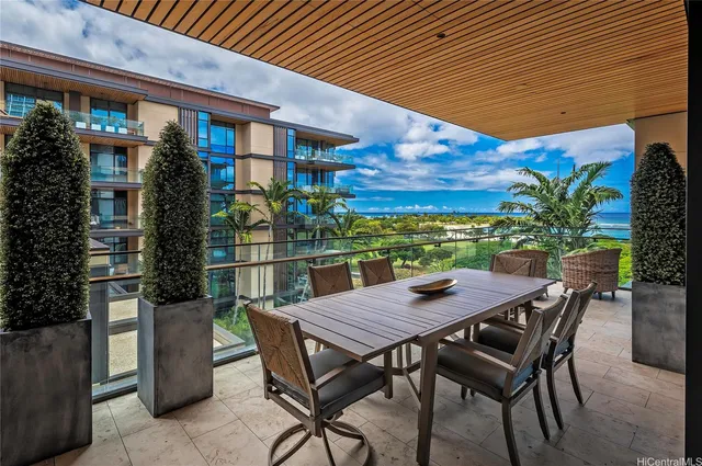a table and chairs in front of a house
