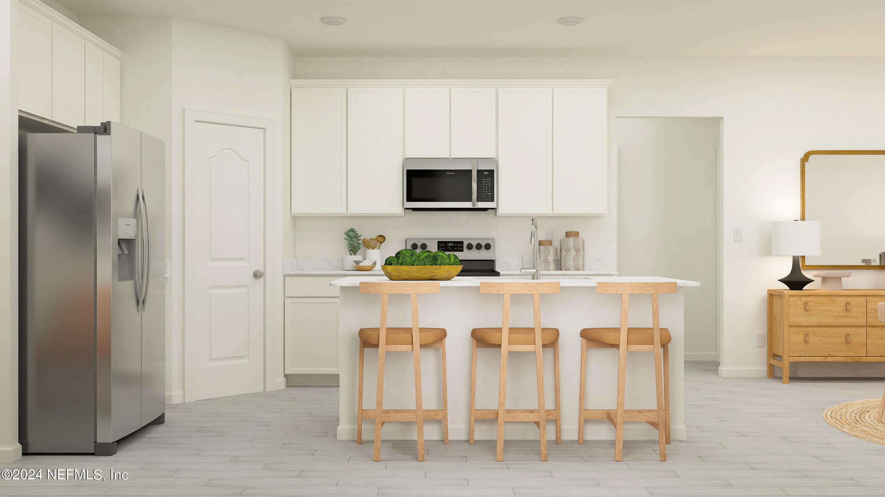 77 River Strand Lane St. Augustine, FL 32084 - Photo 2 of 24 a kitchen with white cabinets and stainless steel appliances