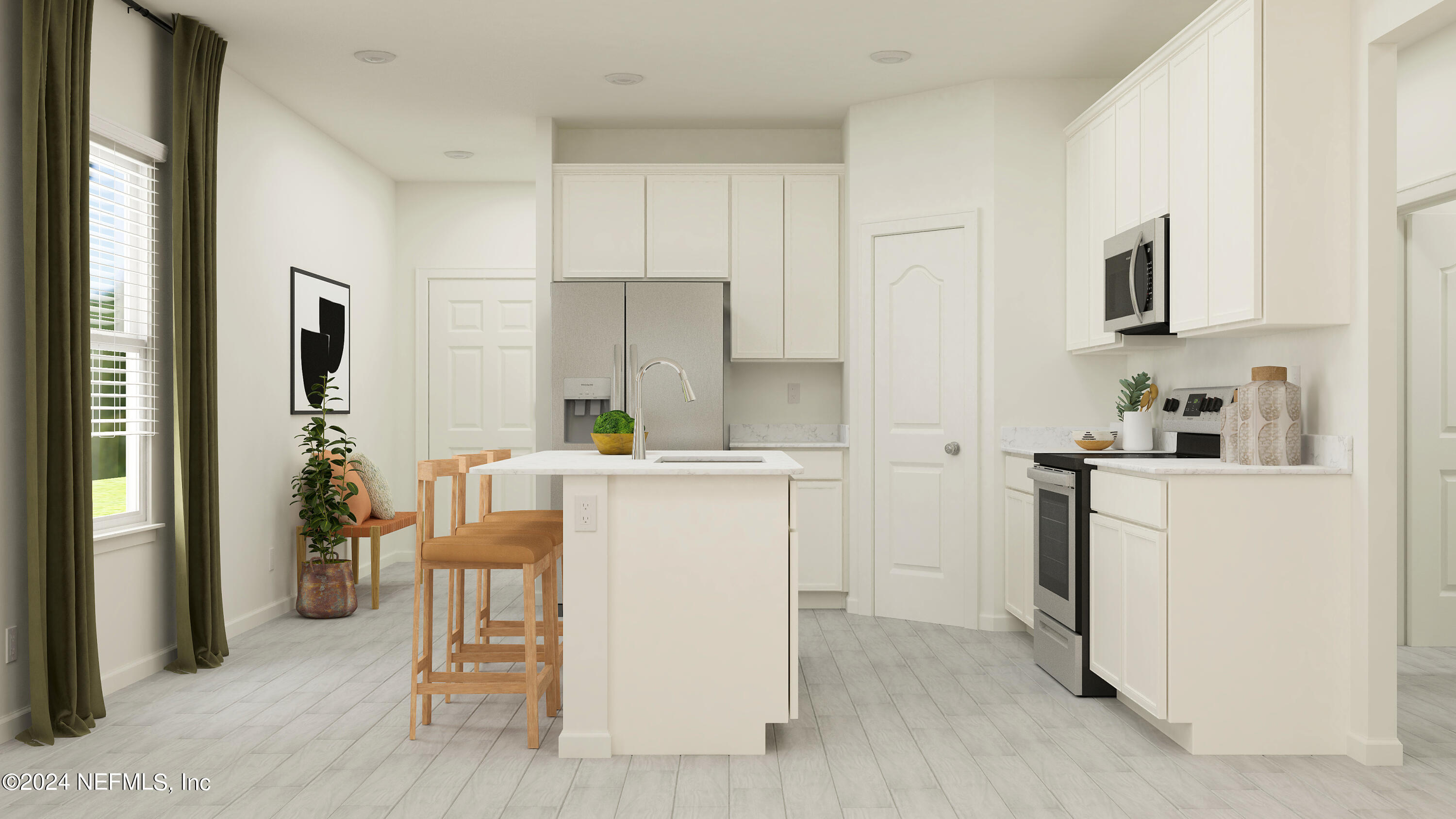 77 River Strand Lane St. Augustine, FL 32084 - Photo 3 of 24 a kitchen with white cabinets and stainless steel appliances