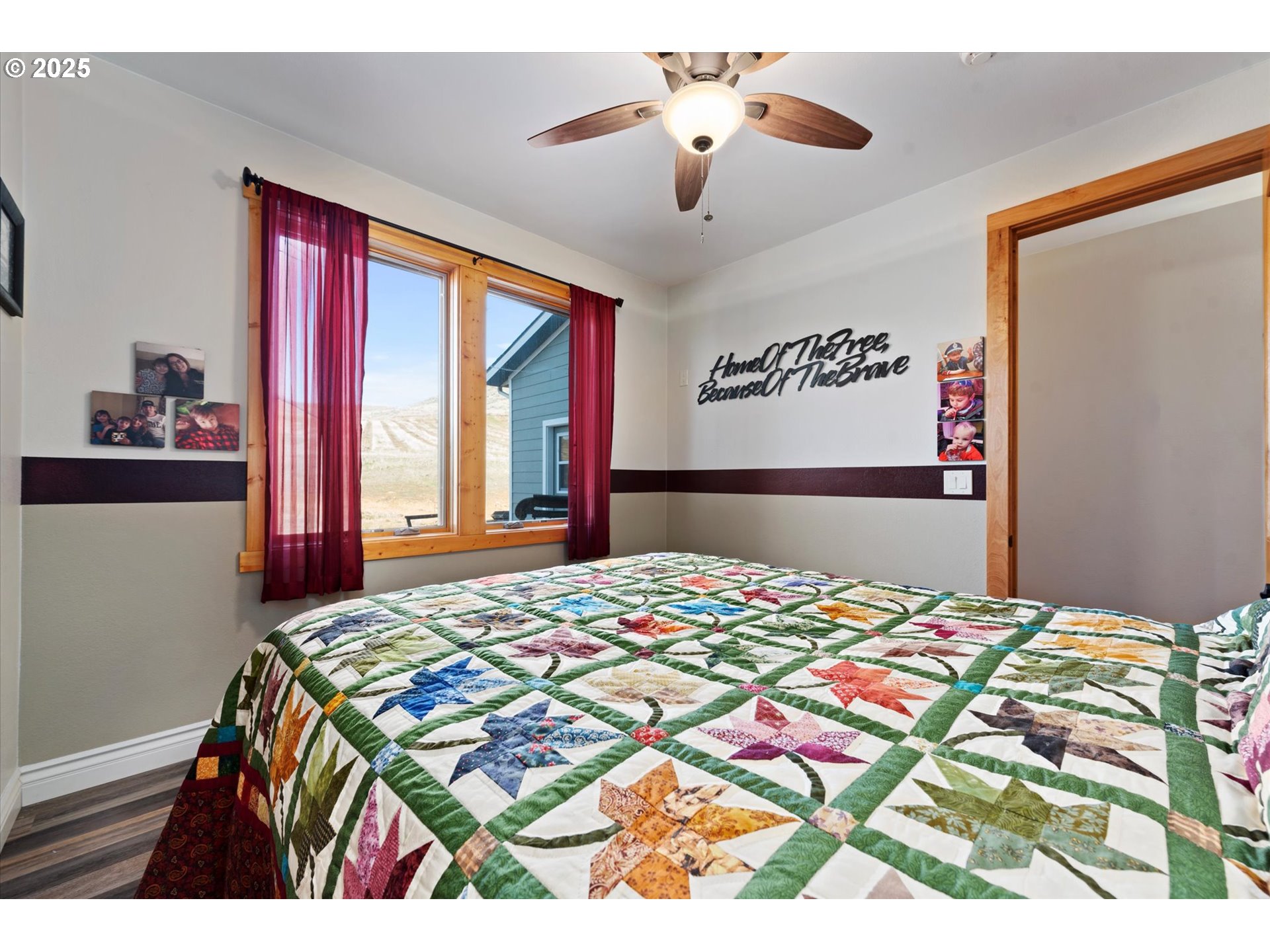 42759 Moody Road Richland, OR 97870 - Photo 17 of 27 a bedroom with a bed and a chandelier