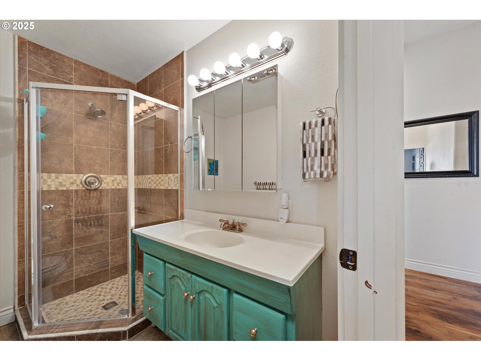 42759 Moody Road Richland, OR 97870 - Photo 18 of 27 a bathroom with a sink mirror and a shower