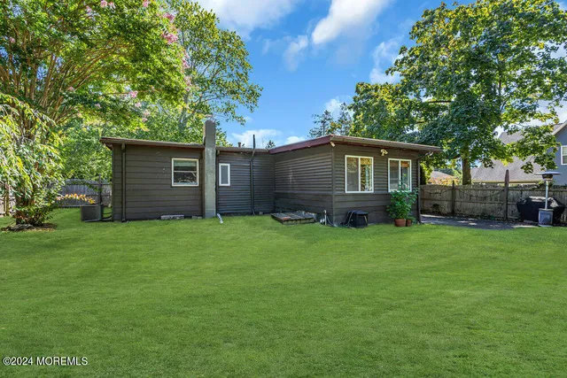 a house view with a garden space
