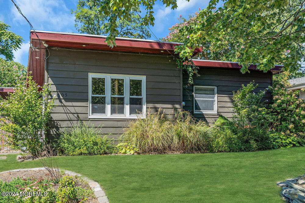 105 Longfellow Avenue Toms River, NJ 08753 - Photo 3 of 38 a view of a house with a garden