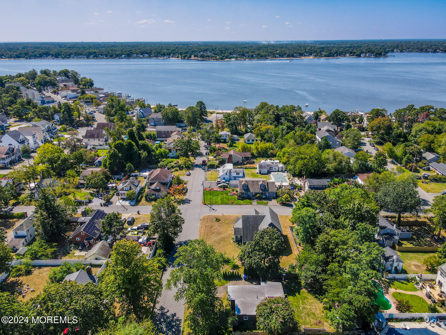 105 Longfellow Avenue Toms River, NJ 08753 - Photo 34 of 38 an aerial view of lake and residential houses with outdoor space