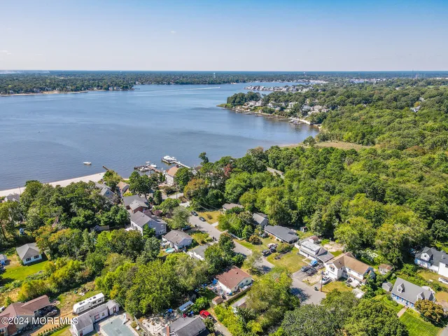 a view of a lake with a city