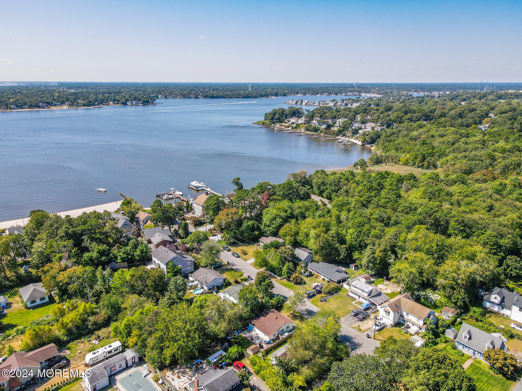 105 Longfellow Avenue Toms River, NJ 08753 - Photo 36 of 38 a view of a lake with a city