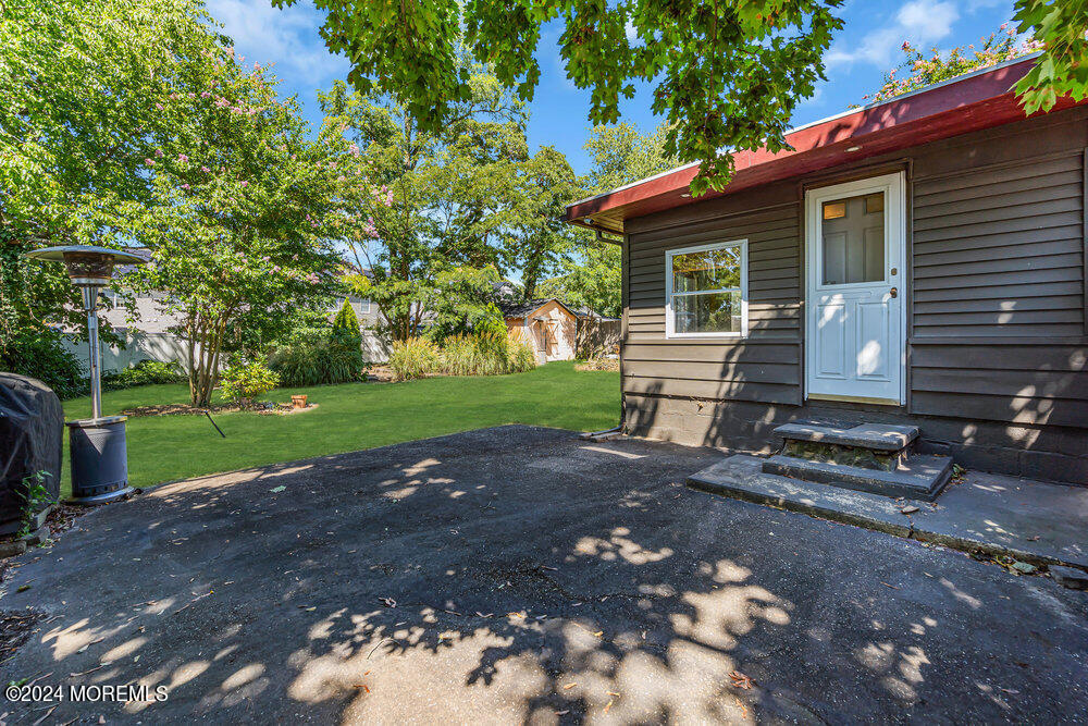 105 Longfellow Avenue Toms River, NJ 08753 - Photo 5 of 38 a view of a house with backyard