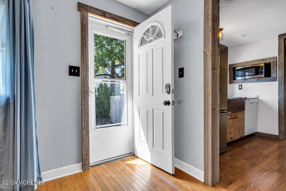 105 Longfellow Avenue Toms River, NJ 08753 - Photo 6 of 38 a view of a kitchen from the hallway