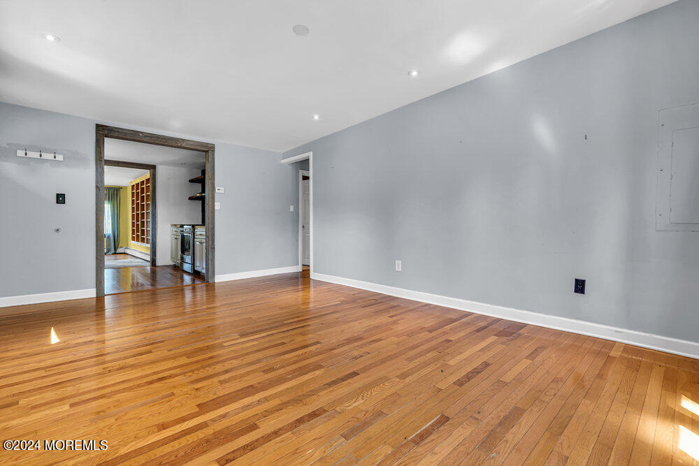 105 Longfellow Avenue Toms River, NJ 08753 - Photo 9 of 38 a view of empty room with wooden floor