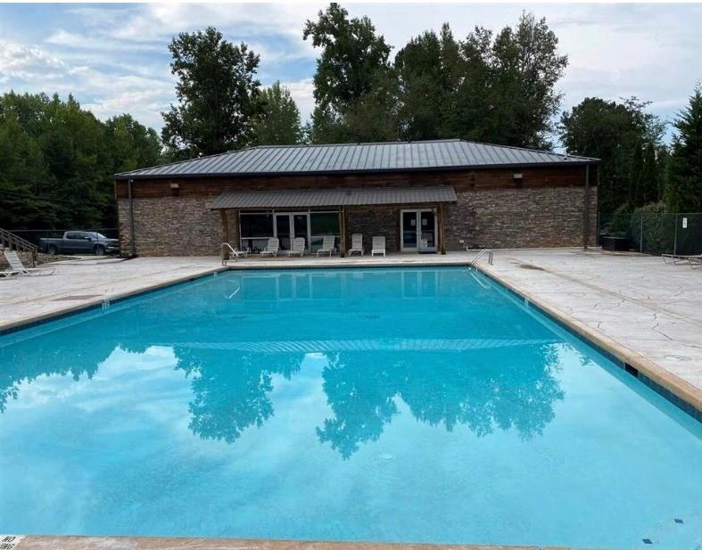 1166 Hunter Drive Ranger, GA 30734 - Photo 33 of 43 a view of a house with pool yard