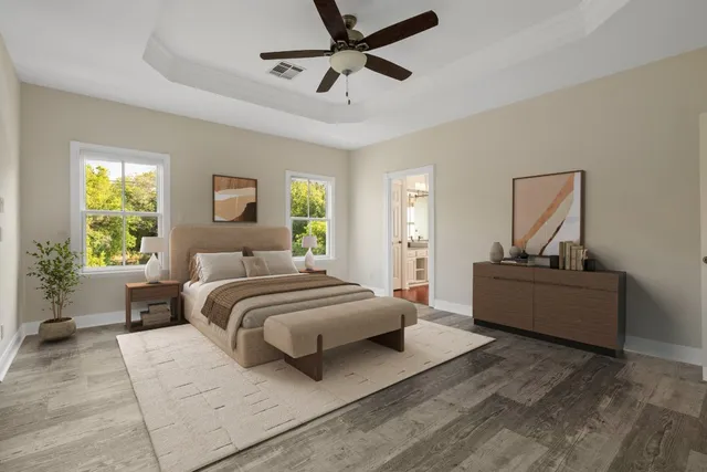 a large spacious bathroom with a large tub and sink