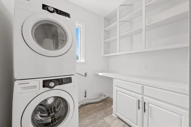 a view of a balcony with wooden floor