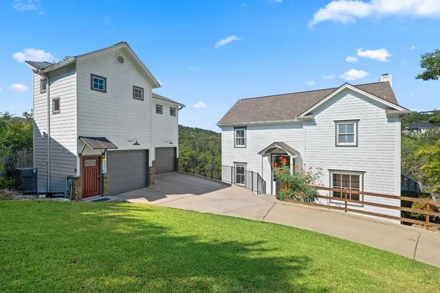 a view of a swimming pool with a yard