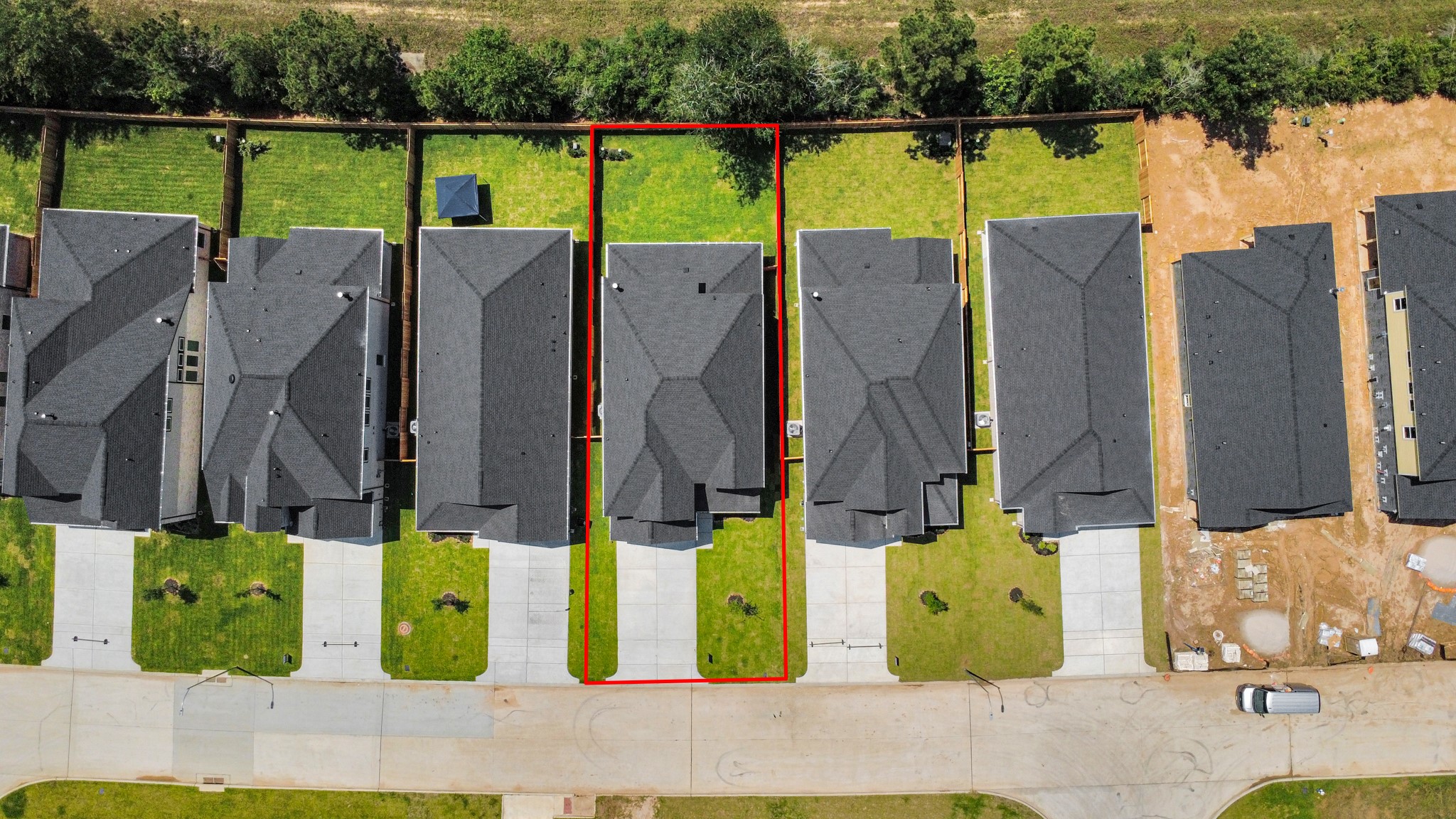 2926 Bury Park Dr Spring Spring, TX 77373 - Photo 5 of 40 An aerial view of a spacious subdivision lot, highlighting a well-maintained yard and a fully fenced perimeter, offering both privacy and expansive outdoor space.