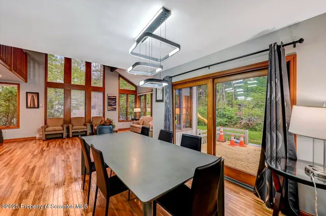 a kitchen with stainless steel appliances granite countertop a refrigerator and a stove