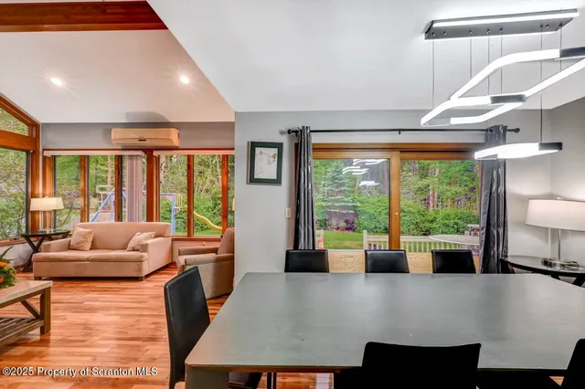 a large kitchen with stainless steel appliances lots of counter space and breakfast area