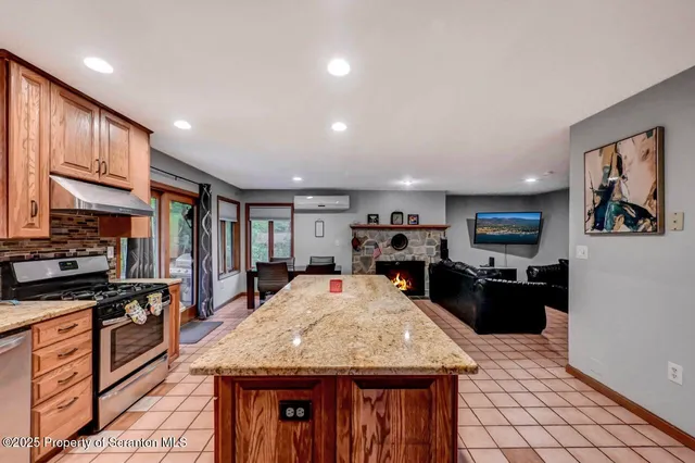 a bedroom with a bed and a lamp