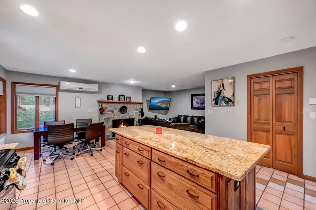 a view of a kitchen with washer and dryer