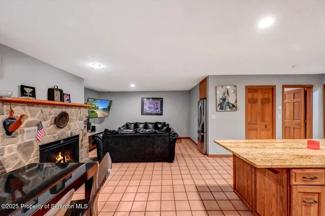 a bathroom with a sink mirror and window