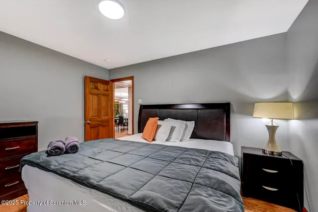 a bedroom with a bed and furniture