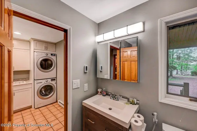 a bathroom with a bathtub and a sink