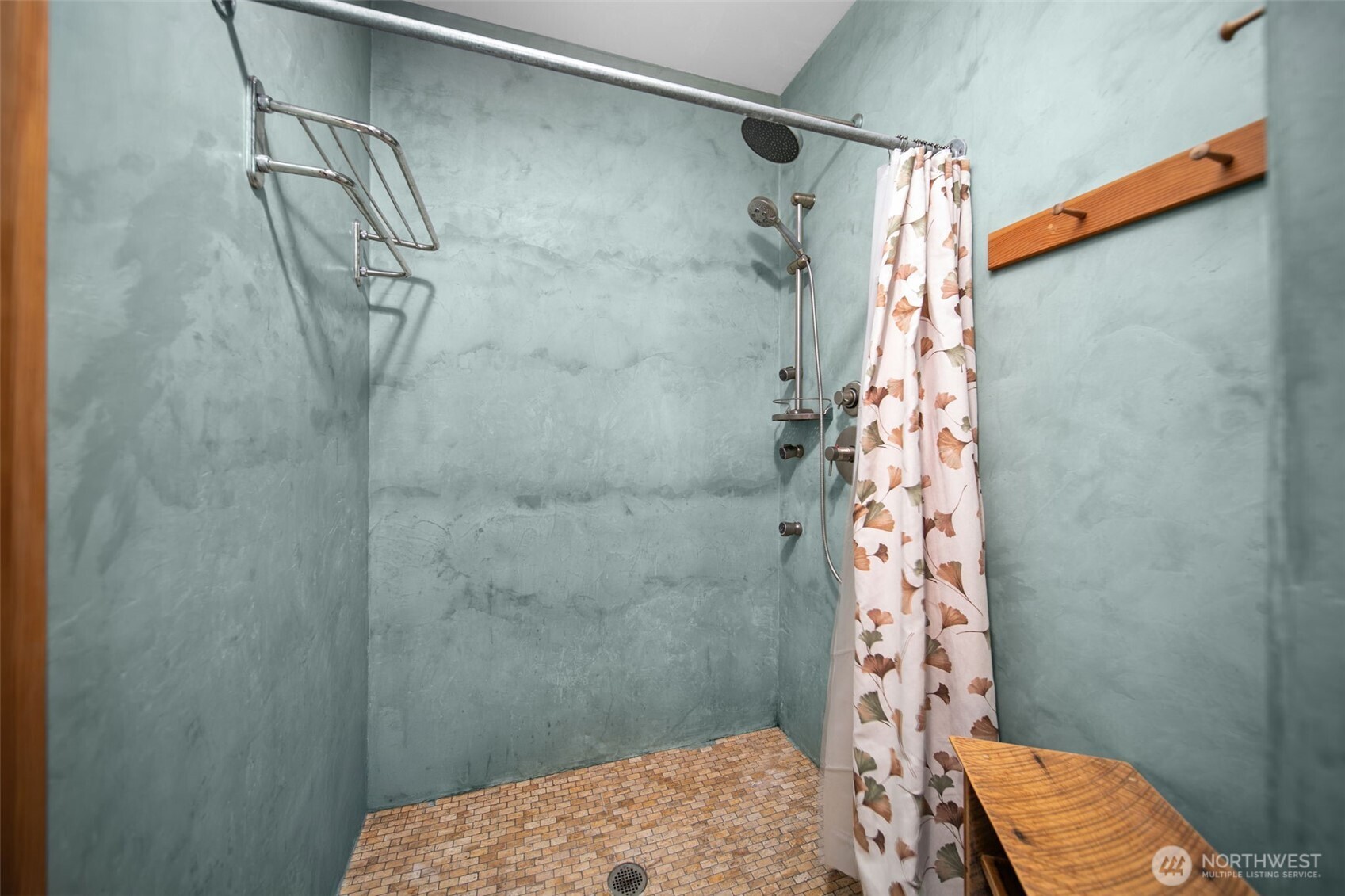 74 Sawtooth View Road Pateros, WA 98846 - Photo 13 of 30 a bathroom with a shower curtain and a shower