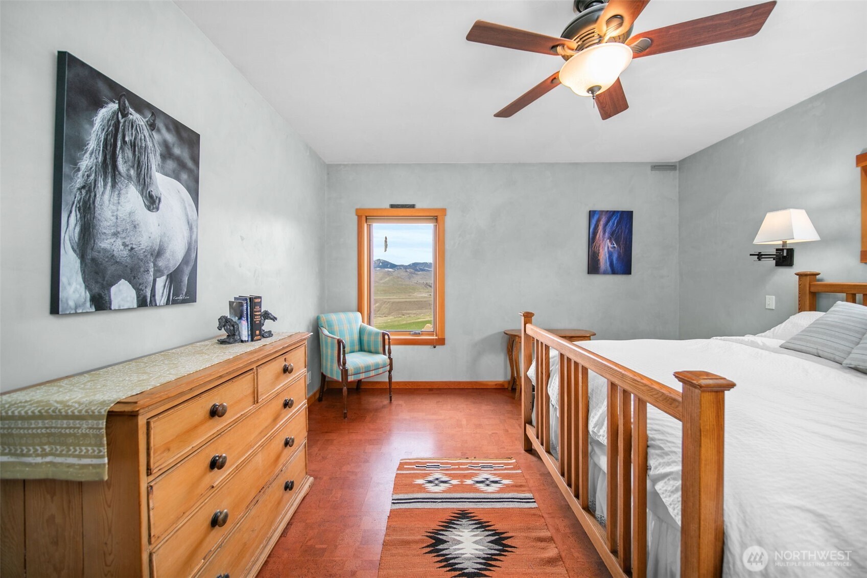 74 Sawtooth View Road Pateros, WA 98846 - Photo 18 of 30 a room with furniture a baby crib and a window