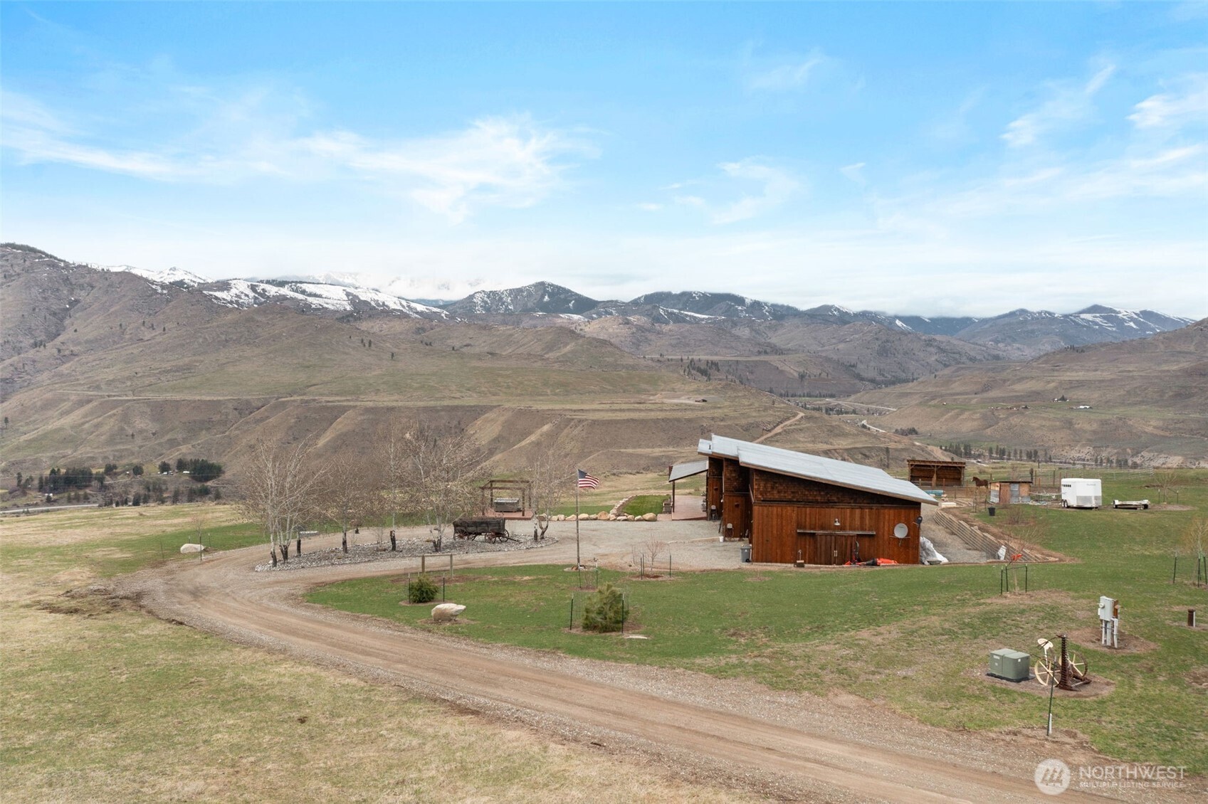 74 Sawtooth View Road Pateros, WA 98846 - Photo 26 of 30 a view of a house with a yard and a mountain view