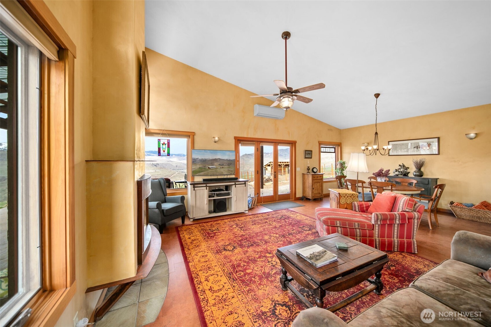 74 Sawtooth View Road Pateros, WA 98846 - Photo 5 of 30 a living room with furniture a window and a flat screen tv