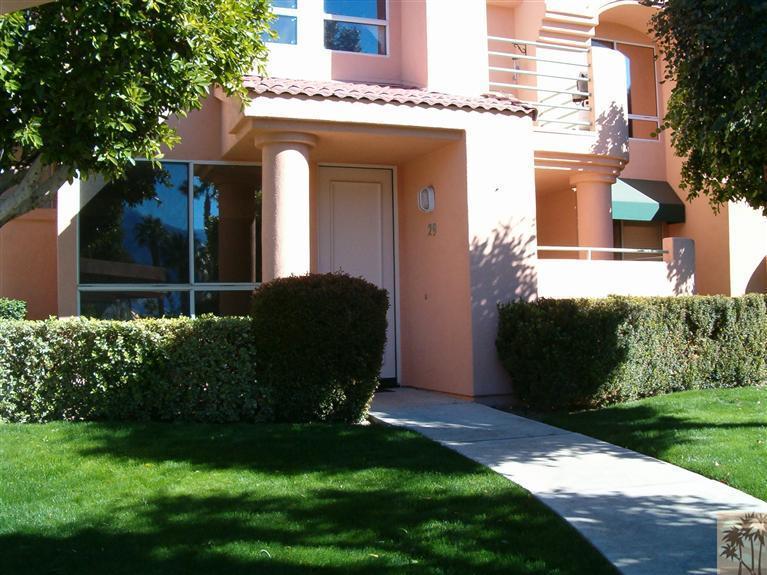 401 El Cielo Road, Unit 29 Palm Springs, CA 92262 - Photo 1 of 25 a front view of a house with a yard