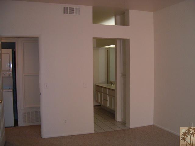 401 El Cielo Road, Unit 29 Palm Springs, CA 92262 - Photo 11 of 25 a view of a hallway with a room