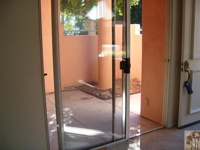 401 El Cielo Road, Unit 29 Palm Springs, CA 92262 - Photo 15 of 25 a view of a bathroom from a glass door