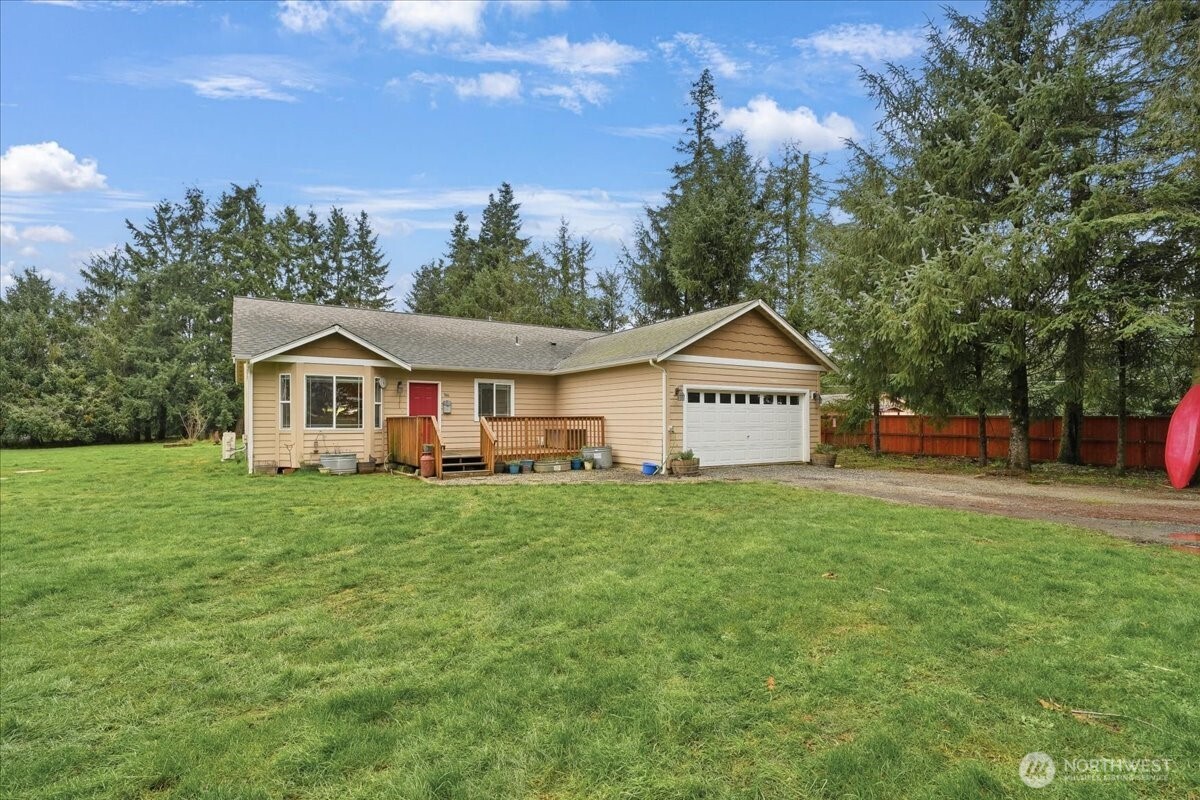 966 South Military Road Winlock, WA 98596 - Photo 1 of 31 a view of a house with backyard and garden