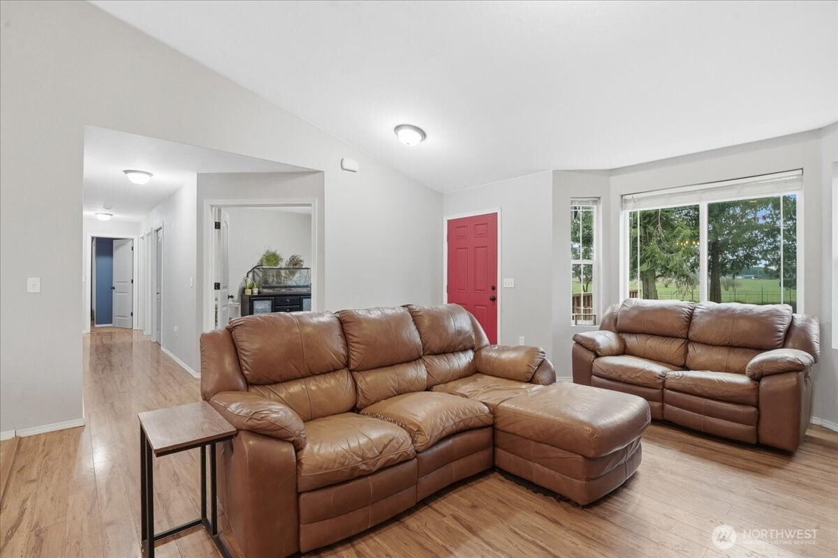 966 South Military Road Winlock, WA 98596 - Photo 11 of 31 a living room with furniture and a large window