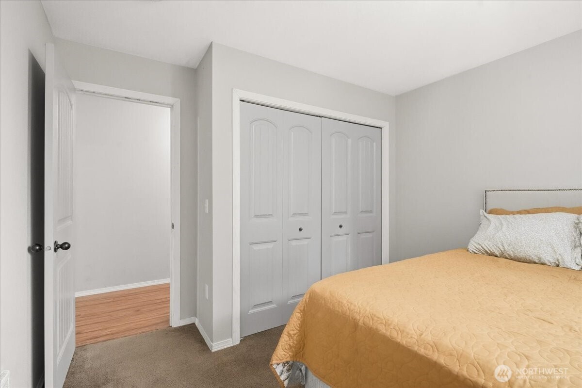 966 South Military Road Winlock, WA 98596 - Photo 23 of 31 a bedroom with a bed and a mirror