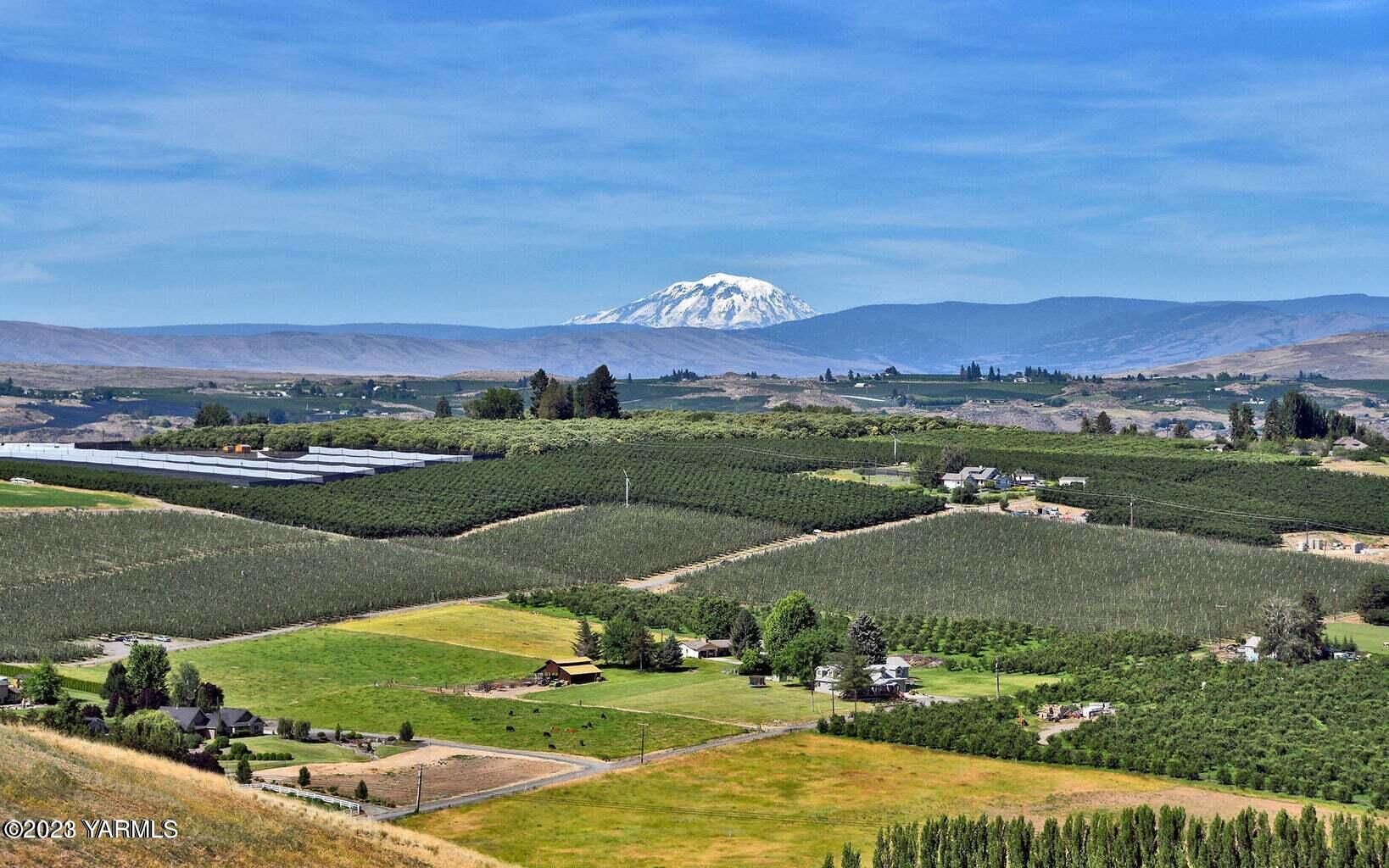 an aerial view of a city with lake view