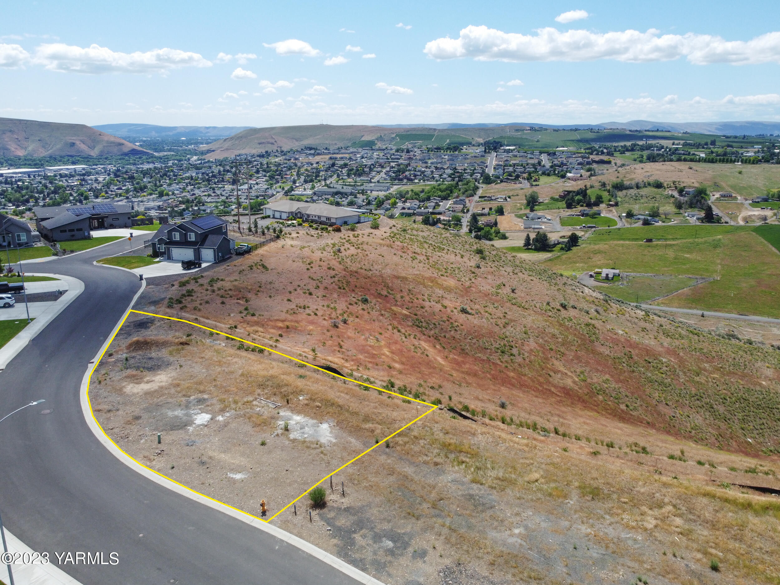 1520 Valhalla Loop Selah, WA 98942 - Photo 7 of 7 an aerial view of a house