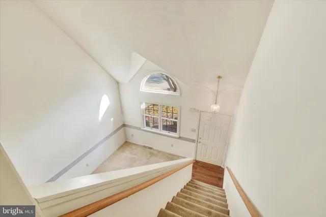 a view of a hallway to a house