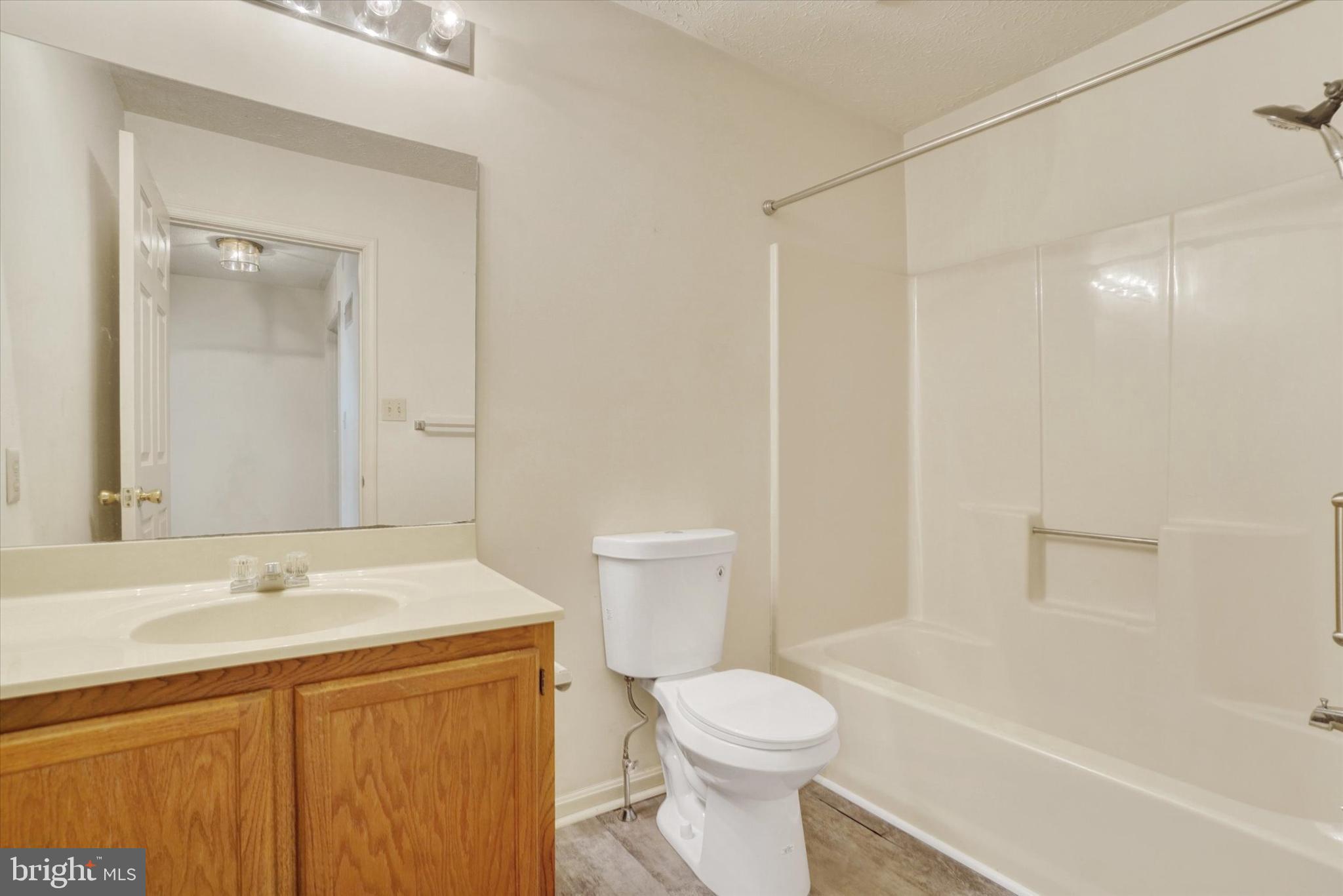 25 Jean Lo Way York, PA 17406 - Photo 22 of 27 a bathroom with a sink a toilet and a bathtub