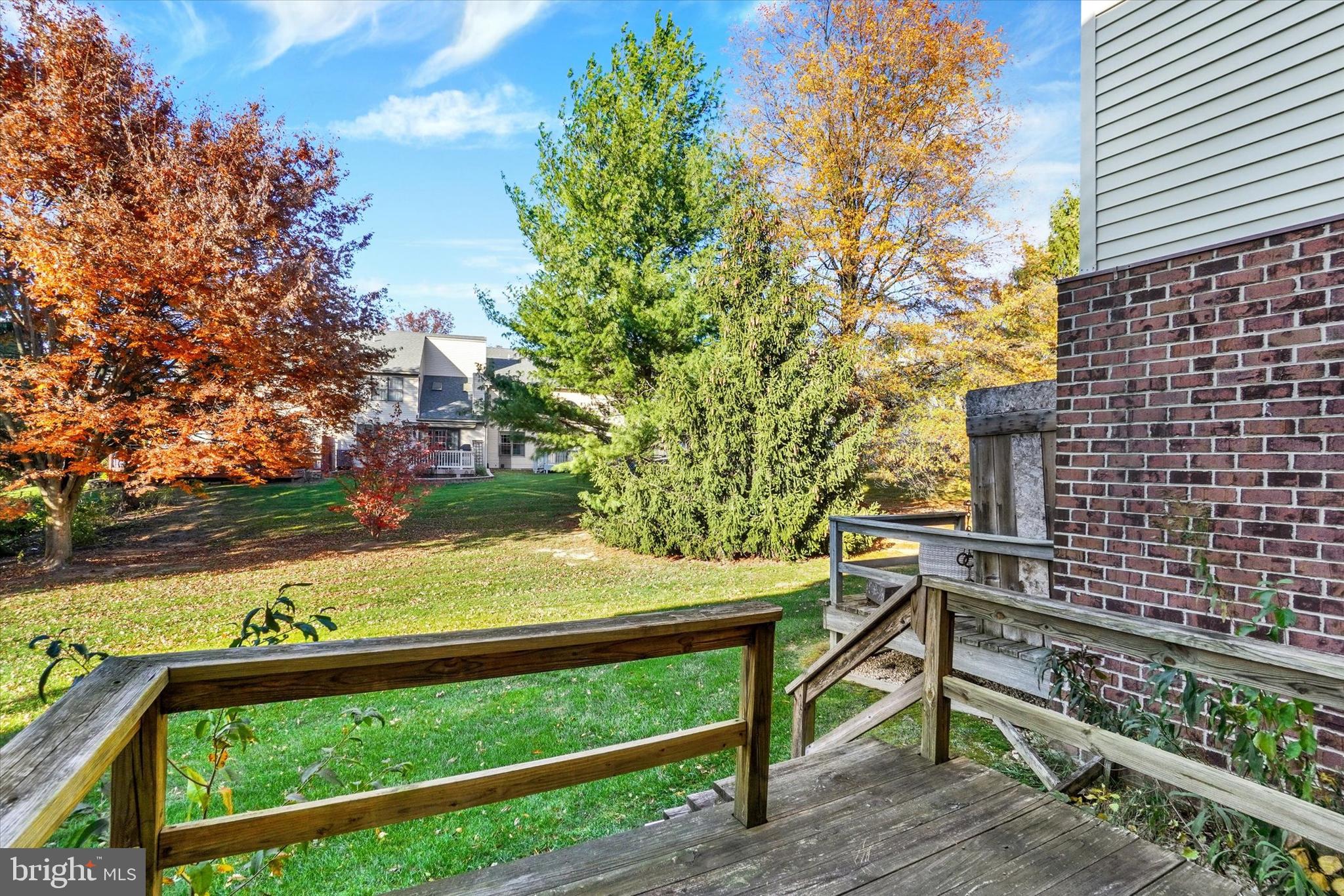25 Jean Lo Way York, PA 17406 - Photo 25 of 27 a view of a wooden bench next to a yard