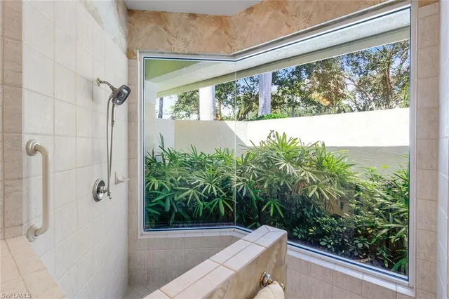 a view of a balcony with plants