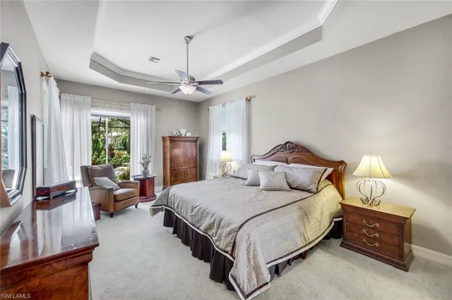 a bedroom with a bed and furniture