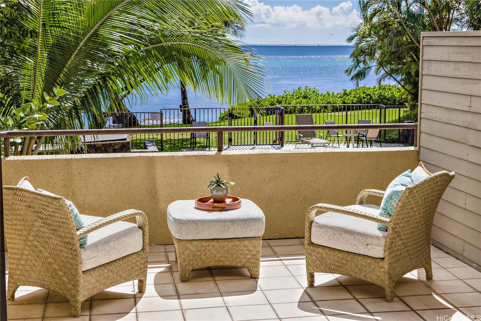 125 A Maunalua Avenue, Unit 9 Honolulu, HI 96821 - Photo 1 of 1 a view of a chairs and table in a balcony